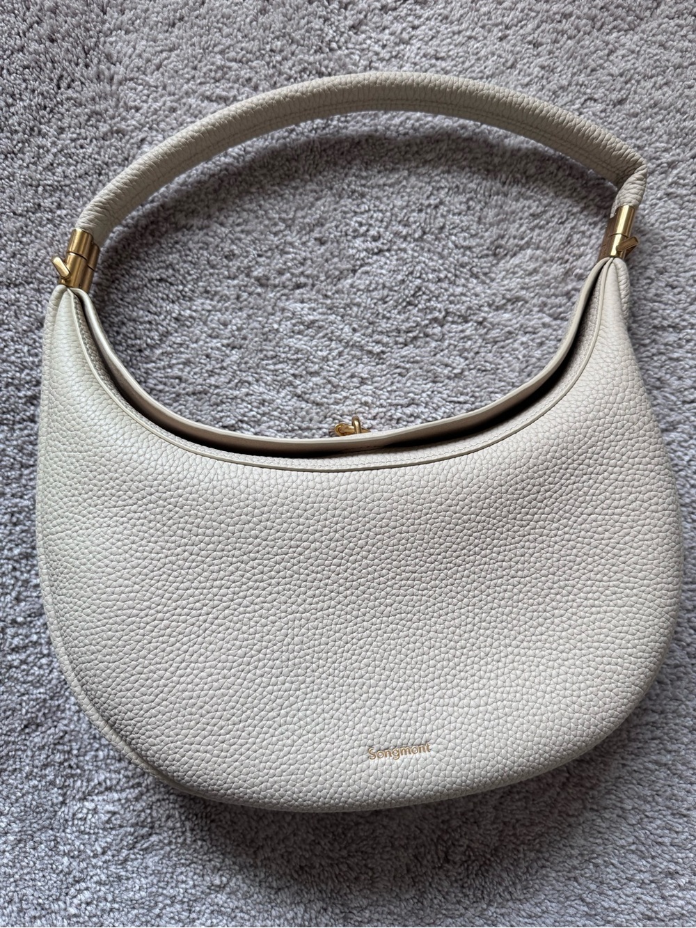 Songmont Pebbled Crescent Hobo in Cream with Gold Hardware